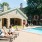 Ample lounge seating surrounding Rock Springs Village's pool