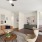 Furnished living room with wall art in a model townhome at Rock Springs Village