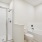 Primary bathroom with a tub and separate shower in townhomes at Rock Springs Village