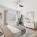 Large windows and ceiling fans in townhome bedrooms at Rock Springs Village